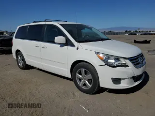 2011 Volkswagen Routan SE with VIN 2V4RW3DG5BR739944, listed as a Copart auction lot 56787495 with 84,932 mi miles and Salvage title. Bid and sale history available at DreamBid. Image 4.