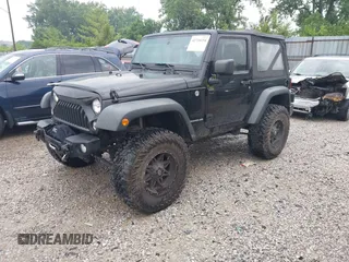 2015 Jeep Wrangler Willys Wheeler with VIN 1C4AJWAG8FL759566, listed as a IAAI auction lot 42716154 with 95,744 mi miles and . Bid and sale history available at DreamBid. Image 2.