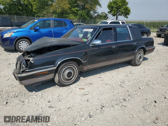 1992 Chrysler New Yorker z VIN 1C3XV66R2ND759195, wystawiony jako Copart lot #69650044 z przebiegiem 70 387 mil mil oraz Szkoda całkowita • Salvage title. Historia ofert i sprzedaży dostępna na DreamBid. Obrazek 1.