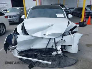 2023 Tesla Model Y Long Range with VIN 7SAYGDEE9PA026005, listed as a IAAI auction lot 41895223 with 43,813 mi miles and . Bid and sale history available at DreamBid. Image 12.
