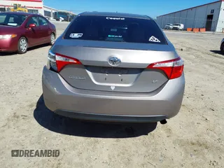 2015 Toyota Corolla L with VIN 2T1BURHE5FC409823, listed as a IAAI auction lot 41628330 with 125,923 mi miles and . Bid and sale history available at DreamBid. Image 16.