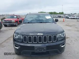 2018 Jeep Grand Cherokee Laredo E with VIN 1C4RJFAG6JC335606, listed as a IAAI auction lot 42280666 with 113,438 mi miles and . Bid and sale history available at DreamBid. Image 6.