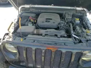 2021 Jeep Wrangler Unlimited Sport Altitude with VIN 1C4HJXDN6MW576290, listed as a Copart auction lot 71164795 with 75,340 mi miles and Salvage title. Bid and sale history available at DreamBid. Image 14.