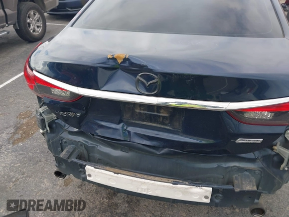 2017 Mazda 6 Sport with VIN JM1GL1U51H1156104, listed as a IAAI auction lot 41769388 with 121,405 mi miles and . Bid and sale history available at DreamBid. Image 6.