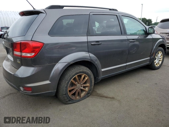 2015 Dodge Journey SXT with VIN 3C4PDCBG7FT669165, listed as a Copart auction lot 62682015 with 145,303 mi miles and Clean title. Bid and sale history available at DreamBid. Image 3.