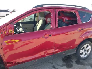 2016 Ford Escape SE with VIN 1FMCU0GX9GUB70800, listed as a IAAI auction lot 41857833 with 83,573 mi miles. Bid and sale history available at carsss.com. Image 13.