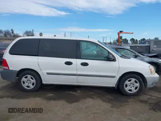 2006 Ford Freestar Cargo with VIN 2FTZA54626BA64158, listed as a IAAI auction lot 41414300 with 196,612 mi miles. Bid and sale history available at carsss.com. Image 13.