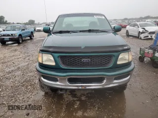 1998 Ford F-150 with VIN 1FTZF18W8WKA89592, listed as a Copart auction lot 65345104 with 166,758 mi miles and Salvage title. Bid and sale history available at DreamBid. Image 5.
