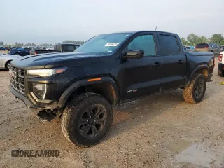 2024 GMC Canyon 4WD AT4 z VIN 1GTP6DEK5R1109902, wystawiony jako Copart lot #54504725 z przebiegiem 28 350 mil mil oraz Szkoda całkowita • Salvage title. Historia ofert i sprzedaży dostępna na DreamBid. Obrazek 1.