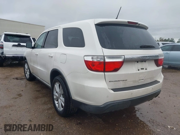 2012 Dodge Durango SXT with VIN 1C4RDHAG5CC308449, listed as a IAAI auction lot 41522856 with 111,284 mi miles and . Bid and sale history available at DreamBid. Image 3.