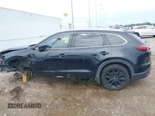 2018 Mazda CX-9 Grand Touring with VIN JM3TCADY3J0228643, listed as a IAAI auction lot 42481641 with 121,714 mi miles and . Bid and sale history available at DreamBid. Image 14.