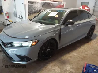2022 Honda Civic Si with VIN 2HGFE1E59NH472028, listed as a IAAI auction lot 41249075 with 37,970 mi miles and . Bid and sale history available at DreamBid. Image 2.
