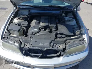 2002 BMW 3 Series 325Ci with VIN WBABN33452PG57400, listed as a IAAI auction lot 41947295 with 230,196 mi miles and . Bid and sale history available at DreamBid. Image 10.