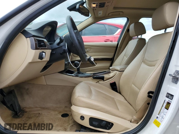 2011 BMW 3 Series 328i xDrive with VIN WBAUU3C5XBA542974, listed as a Copart auction lot 63331535 with 276,912 mi miles and Salvage title. Bid and sale history available at DreamBid. Image 7.
