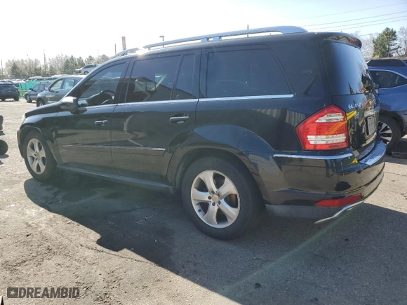 2010 Mercedes-Benz GL-Class GL 450 with VIN 4JGBF7BE4AA536434, listed as a Copart auction lot 52201875 with 218,817 mi miles and Clean Title. Bid and sale history available at carsss.com. Image 2.