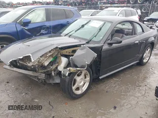 2004 Ford Mustang Standard z VIN 1FAFP40414F105171, wystawiony jako IAAI lot #41754232 z przebiegiem Nie podano mil oraz . Historia ofert i sprzedaży dostępna na DreamBid. Obrazek 17.