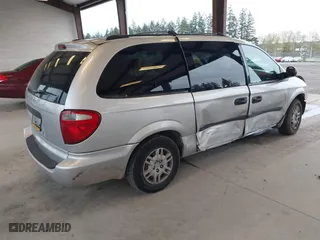 2005 Dodge Caravan SE with VIN 1D4GP24R85B351591, listed as a IAAI auction lot 41949337 with 130,821 mi miles. Bid and sale history available at carsss.com. Image 4.