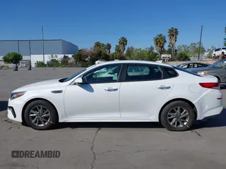 2019 Kia Optima LX with VIN 5XXGT4L33KG324175, listed as a IAAI auction lot 42139795 with 105,273 mi miles. Bid and sale history available at carsss.com. Image 14.