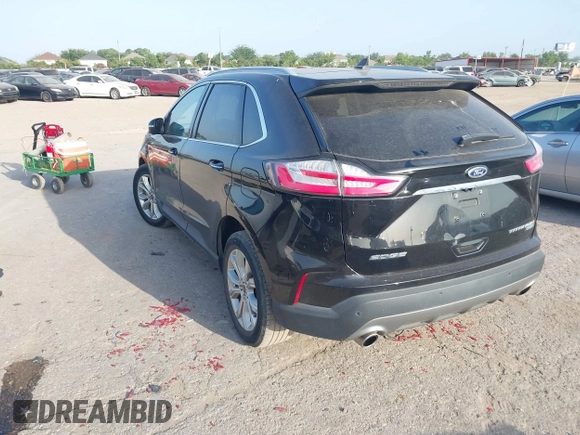 2020 Ford Edge Titanium with VIN 2FMPK3K94LBB37706, listed as a IAAI auction lot 42524373 with 77,849 mi miles and . Bid and sale history available at DreamBid. Image 3.