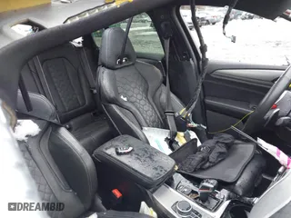 2020 BMW X4 M with VIN 5YMUJ0C01LLU67190, listed as a IAAI auction lot 41669132 with 55,609 mi miles. Bid and sale history available at carsss.com. Image 5.