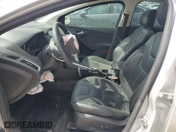 2017 Ford Focus Titanium with VIN 1FADP3J23HL347739, listed as a Copart auction lot 49385365 with 79,484 mi miles and Salvage title. Bid and sale history available at DreamBid. Image 7.