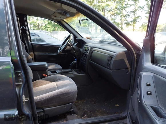 2001 Jeep Grand Cherokee Laredo with VIN 1J4GW48SX1C585867, listed as a IAAI auction lot 42793657 with 197,167 mi miles and . Bid and sale history available at DreamBid. Image 5.