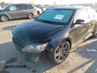 2013 Scion tC with VIN JTKJF5C77D3050609, listed as a IAAI auction lot 41872911 with 197,531 mi miles. Bid and sale history available at carsss.com. Image 6.