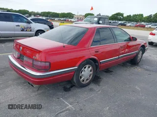1995 Cadillac Seville Luxury SLS with VIN 1G6KS52Y7SU833943, listed as a IAAI auction lot 40873559 with 1 mi miles. Bid and sale history available at carsss.com. Image 4.