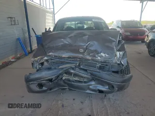 2001 Dodge Dakota Sport z VIN 1B7HL2AN21S298590, wystawiony jako Copart lot #54430385 z przebiegiem 175 365 mil mil oraz Szkoda całkowita • Salvage title. Historia ofert i sprzedaży dostępna na DreamBid. Obrazek 5.