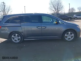 2013 Honda Odyssey Touring with VIN 5FNRL5H97DB018839, listed as a IAAI auction lot 41884016 with 171,650 mi miles. Bid and sale history available at carsss.com. Image 13.