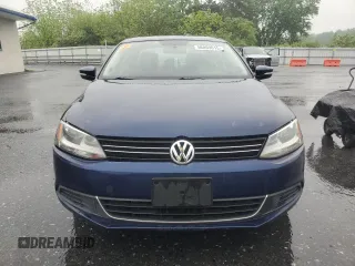 2013 Volkswagen Jetta TDI w/Premium with VIN 3VW3L7AJ2DM387655, listed as a Copart auction lot 56869615 with Not provided miles and Clean title. Bid and sale history available at DreamBid. Image 5.