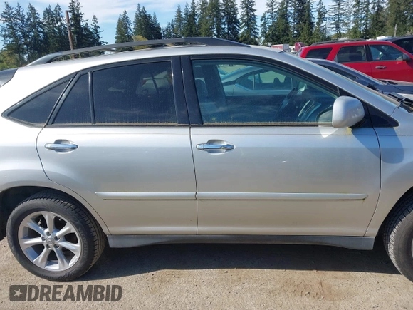2008 Lexus RX with VIN 2T2HK31U08C053634, listed as a IAAI auction lot 42061737 with 306,854 mi miles. Bid and sale history available at carsss.com. Image 13.