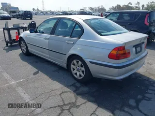 2002 BMW 3 Series 325i with VIN WBAET37492NG83135, listed as a IAAI auction lot 42028502 with 184,216 mi miles. Bid and sale history available at carsss.com. Image 3.