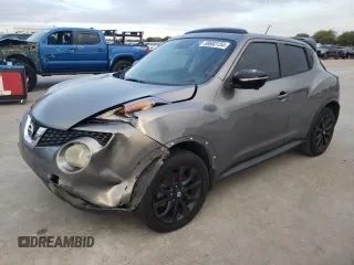 2015 Nissan Juke SL z VIN JN8AF5MR0FT502205, wystawiony jako Copart lot #80683154 z przebiegiem 131 876 mil mil oraz Szkody całkowita. Historia ofert i sprzedaży dostępna na DreamBid. Obrazek 1.