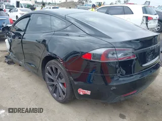 2017 Tesla Model S 60 with VIN 5YJSA1E12HF195965, listed as a IAAI auction lot 41946148 with 63,992 mi miles and . Bid and sale history available at DreamBid. Image 3.