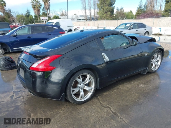 2012 Nissan 370Z Touring with VIN JN1AZ4EH4CM561303, listed as a IAAI auction lot 41788638 with 111,958 mi miles. Bid and sale history available at carsss.com. Image 4.