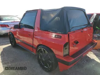 1990 Geo Tracker z VIN 2CNBJ18U7L6220617, wystawiony jako Copart lot #75265974 z przebiegiem 43 743 mil mil oraz Nie do naprawy. Historia ofert i sprzedaży dostępna na DreamBid. Obrazek 2.
