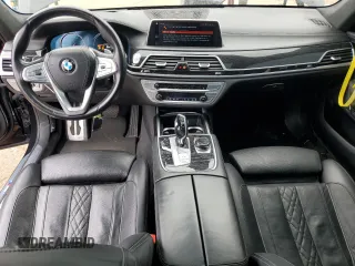 2018 BMW 7 Series 750i xDrive z VIN WBA7B0C52JG527205, wystawiony jako Copart lot #57452265 z przebiegiem 120 655 mil mil oraz Czysty tytuł • Clean title. Historia ofert i sprzedaży dostępna na DreamBid. Obrazek 8.