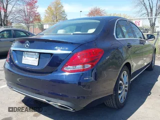 2015 Mercedes-Benz C 300 with VIN 55SWF4JB7FU059751, listed as a IAAI auction lot 42039373 with 59,625 mi miles and . Bid and sale history available at DreamBid. Image 4.