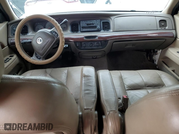 2003 Mercury Grand Marquis GS Convenience z VIN 2MEFM74WX3X633910, wystawiony jako Copart lot #52999865 z przebiegiem 207 970 mil mil oraz Szkoda całkowita • Salvage title. Historia ofert i sprzedaży dostępna na DreamBid. Obrazek 8.