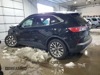 2021 Ford Escape Titanium with VIN 1FMCU9J91MUA57451, listed as a Copart auction lot 44678135 with 74,795 mi miles and Salvage title. Bid and sale history available at DreamBid. Image 2.