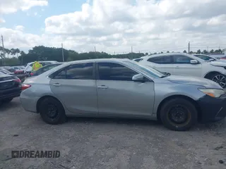 2015 Toyota Camry XLE with VIN 4T1BF1FK0FU093475, listed as a IAAI auction lot 42061877 with 131,618 mi miles. Bid and sale history available at carsss.com. Image 13.