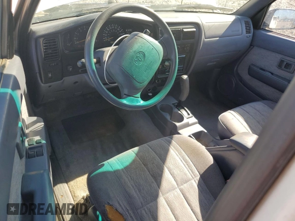 1999 Toyota Tacoma PreRunner with VIN 4TASM92N0XZ559544, listed as a Copart auction lot 86626024 with 209,794 mi miles and Salvage title. Bid and sale history available at DreamBid. Image 8.