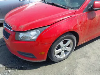 2014 Chevrolet Cruze 1LT z VIN 1G1PC5SB2E7140253, wystawiony jako IAAI lot #42323140 z przebiegiem 103 503 mil mil oraz . Historia ofert i sprzedaży dostępna na DreamBid. Obrazek 12.