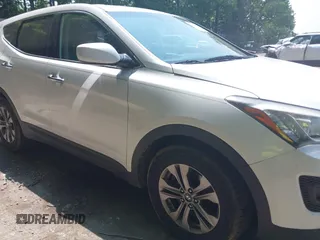 2015 Hyundai Santa Fe z VIN 5XYZTDLB3FG298677, wystawiony jako IAAI lot #42436155 z przebiegiem 118 181 mil mil oraz . Historia ofert i sprzedaży dostępna na DreamBid. Obrazek 19.