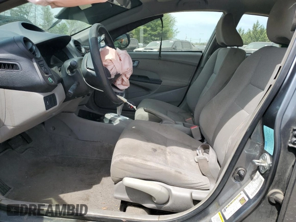 2012 Honda Insight z VIN JHMZE2H34CS006488, wystawiony jako Copart lot #54203575 z przebiegiem Nie podano mil oraz Szkoda całkowita • Salvage title. Historia ofert i sprzedaży dostępna na DreamBid. Obrazek 7.