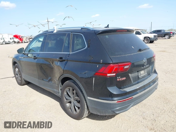 2024 Volkswagen Tiguan SE with VIN 3VVNB7AXXRM031028, listed as a IAAI auction lot 41832841 with 16,170 mi miles and . Bid and sale history available at DreamBid. Image 3.
