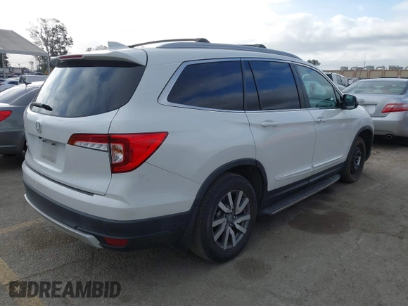 2020 Honda Pilot EX-L with VIN 5FNYF5H57LB003059, listed as a IAAI auction lot 41685916 with 114,742 mi miles. Bid and sale history available at carsss.com. Image 4.