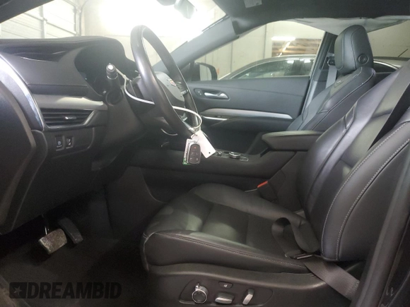 2023 Cadillac XT4 AWD Premium Luxury z VIN 1GYFZDR43PF174188, wystawiony jako Copart lot #59106355 z przebiegiem 27 530 mil mil oraz Szkoda całkowita • Salvage title. Historia ofert i sprzedaży dostępna na DreamBid. Obrazek 7.