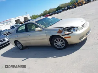 2003 Lexus ES 300 with VIN JTHBF30G730144122, listed as a IAAI auction lot 41738397 with 264,443 mi miles and . Bid and sale history available at carsss.com. Image 13.